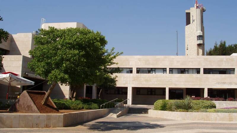 Picture of Hebrew University, Campus Mount Scopus: right - Frank Sinatra International Student Centre, left - entrance to Frank Sinatra restaurant, place of July 31st 2002 terrorist attack, the tree is an artistic installation in remembrance of the attack.